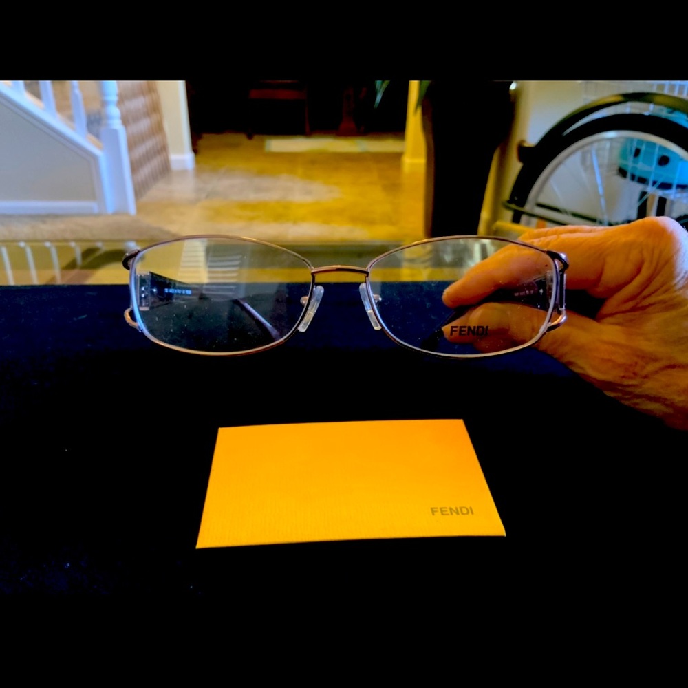 Fendi-new, color is deep wine. Jeweled temples. Size 55/15 metal/zyl combo
